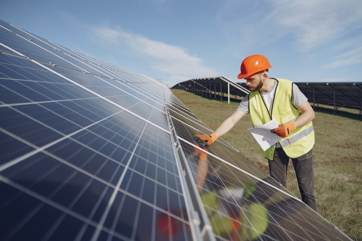 Solar panel technician at work